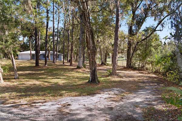 15.6 Acres of Recreational Land with Home for Sale in Brooksville, Florida