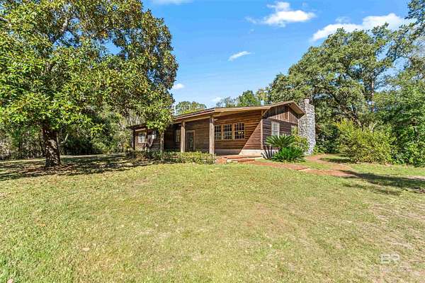 37.2 Acres of Recreational Land with Home for Sale in Lillian, Alabama