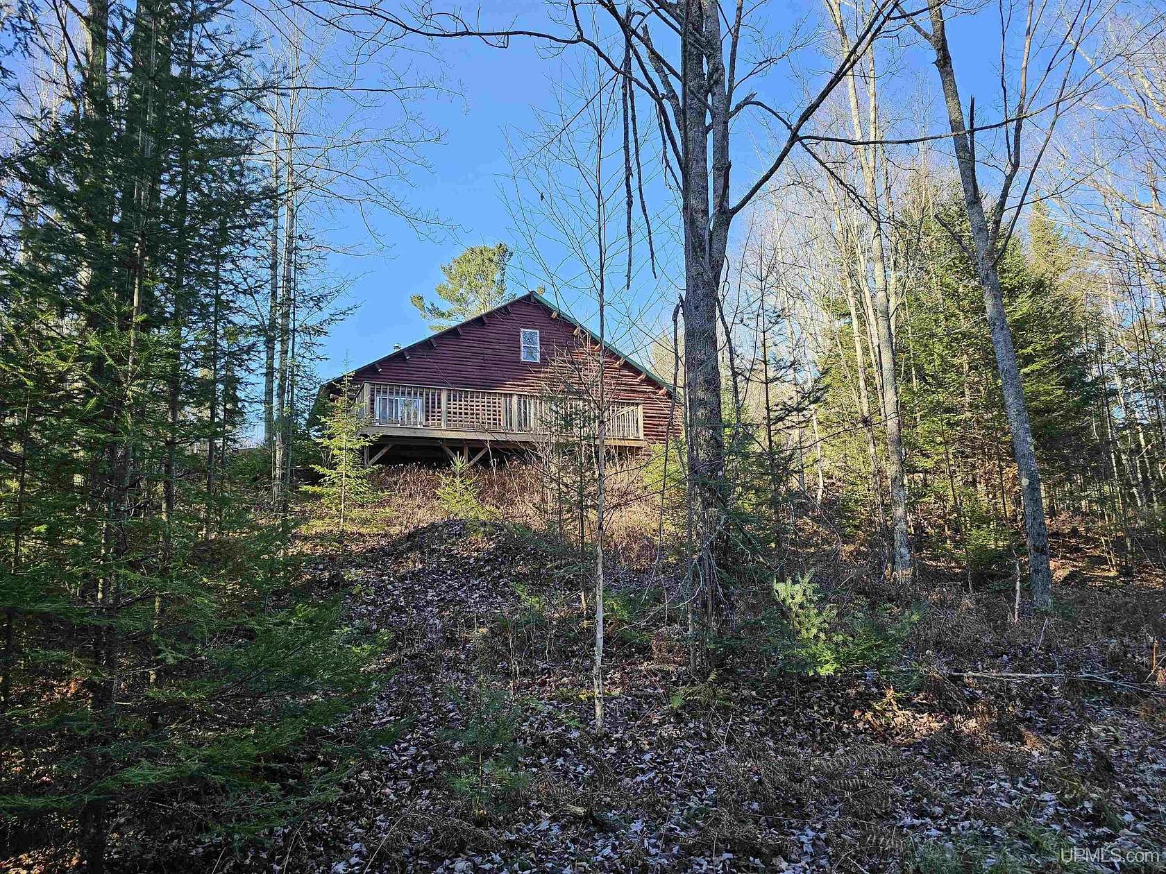 20 Acres of Recreational Land with Home for Sale in Rapid River, Michigan