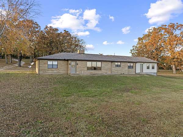 20 Acres of Agricultural Land with Home for Sale in Lead Hill, Arkansas