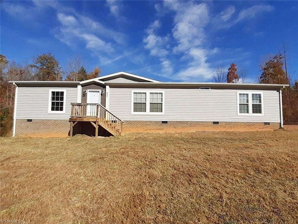 4 Acres of Residential Land with Home for Sale in Madison, North Carolina