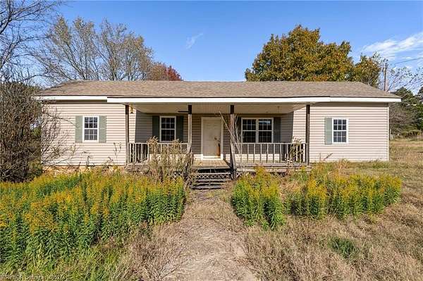 32.3 Acres of Land with Home for Sale in Booneville, Arkansas