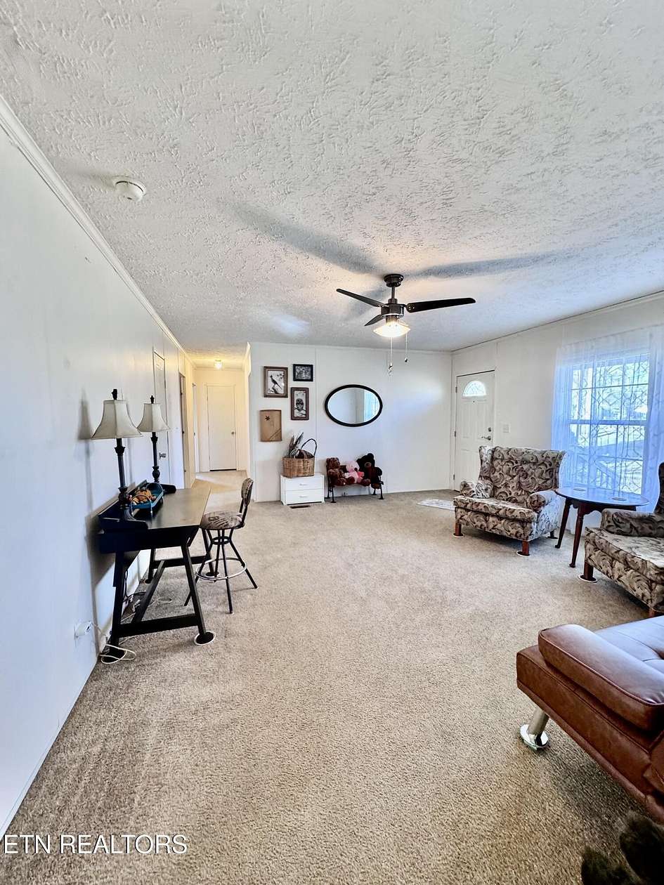 2.3 Acres of Residential Land with Home for Sale in Strawberry Plains, Tennessee