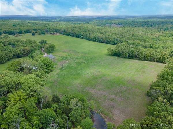 85 Acres of Recreational Land & Farm for Sale in Linn Creek, Missouri