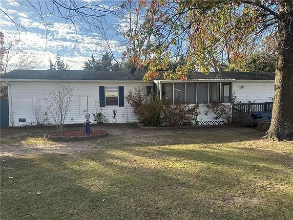 0.36 Acres of Residential Land with Home for Sale in Warrensburg, Missouri