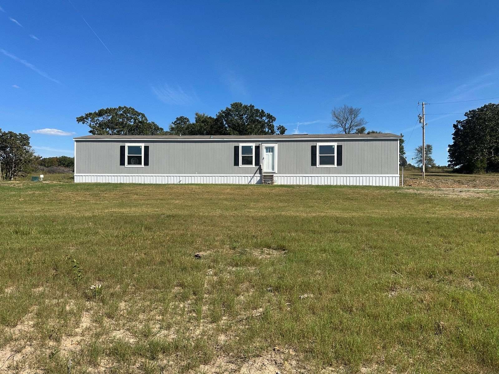 5 Acres of Land with Home for Auction in Wewoka, Oklahoma