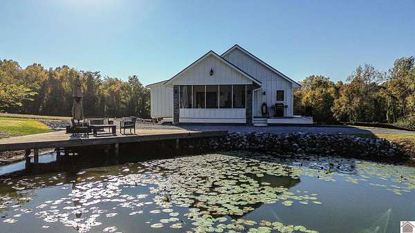 10.6 Acres of Recreational Land with Home for Sale in West Paducah, Kentucky