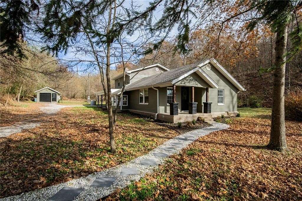 9 Acres of Residential Land with Home for Sale in Fayetteville, Arkansas