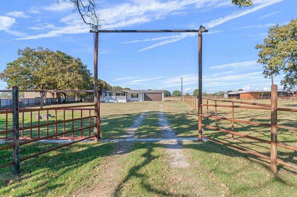 11 Acres of Land with Home for Sale in Scurry, Texas