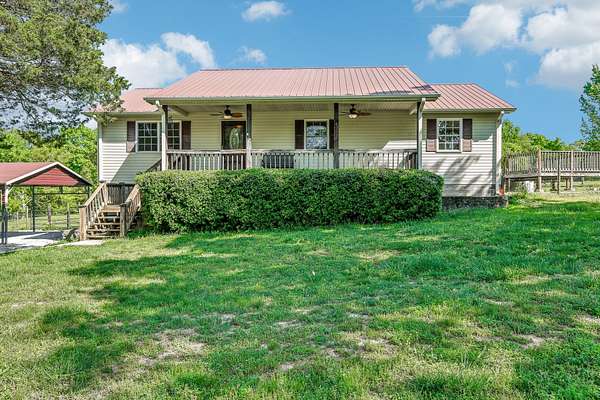 34 Acres of Land with Home for Sale in Erin, Tennessee