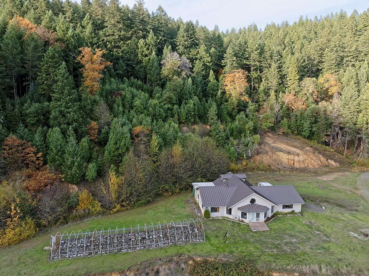 140 Acres of Recreational Land with Home for Sale in Wolf Creek, Oregon
