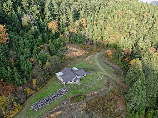 140 Acres of Recreational Land with Home for Sale in Wolf Creek, Oregon