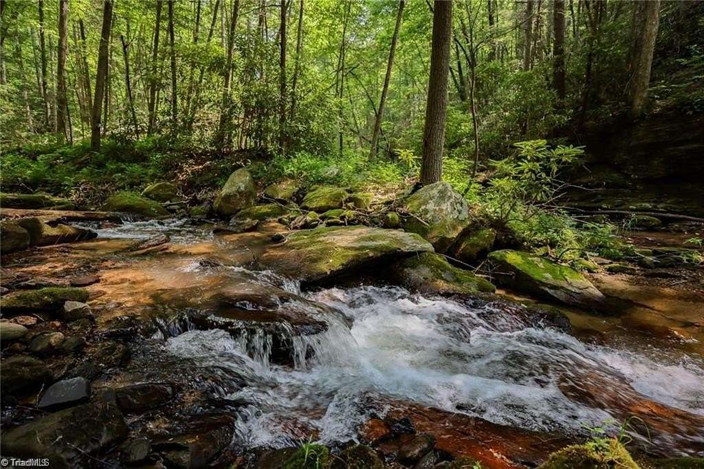 2 Acres of Residential Land with Home for Sale in Purlear, North Carolina