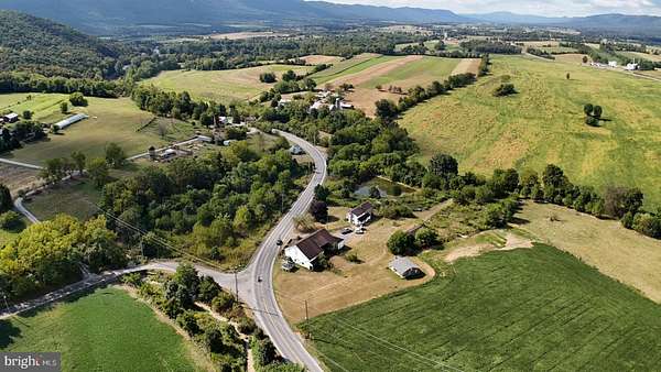24.7 Acres of Agricultural Land with Home for Auction in Spring Run, Pennsylvania