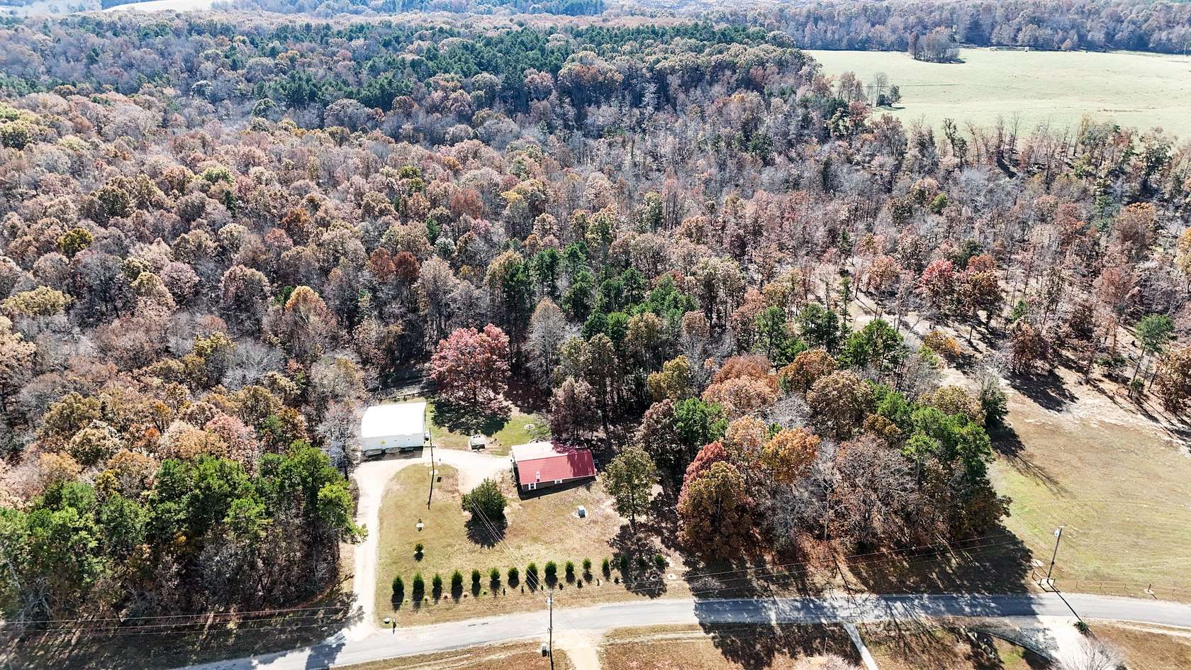 31.9 Acres of Recreational Land with Home for Sale in Lutts, Tennessee
