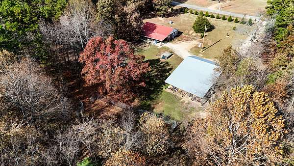 31.9 Acres of Recreational Land with Home for Sale in Lutts, Tennessee