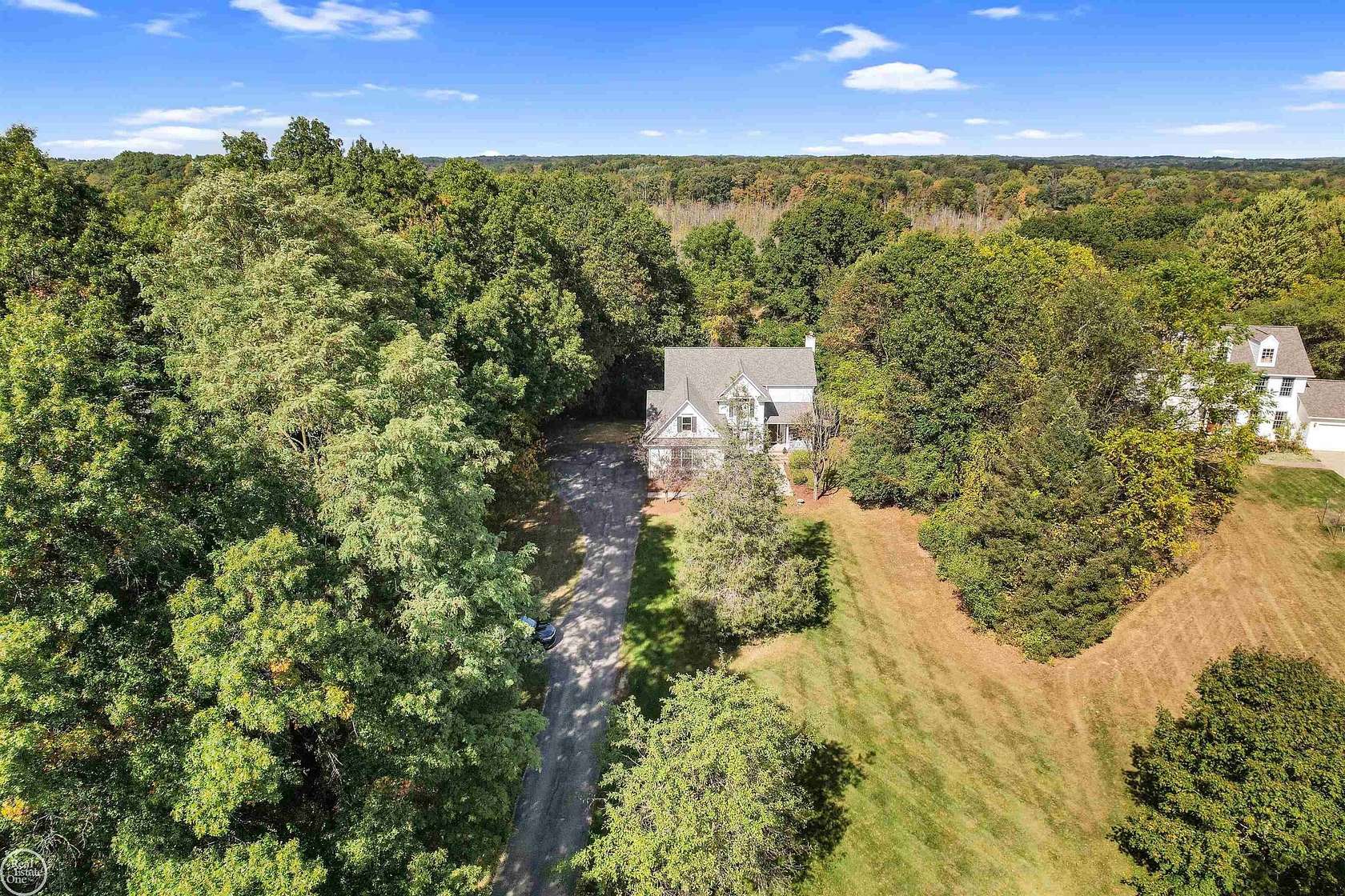 1.5 Acres of Residential Land with Home for Sale in Davisburg, Michigan