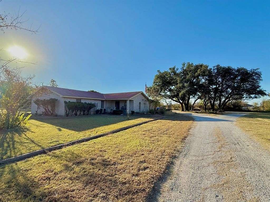 2 Acres of Residential Land with Home for Sale in Hamilton, Texas