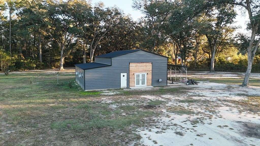 11.7 Acres of Land with Home for Sale in Thomasville, Georgia