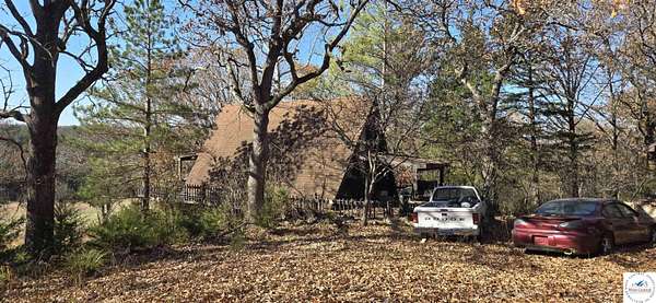 4.5 Acres of Residential Land with Home for Sale in Warsaw, Missouri