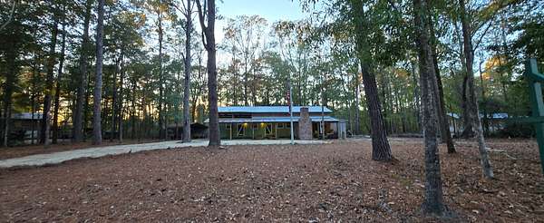 1.4 Acres of Residential Land with Home for Sale in Columbia, Mississippi