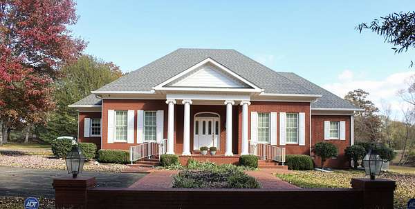 2.76 Acres of Residential Land with Home for Sale in Adamsville, Tennessee