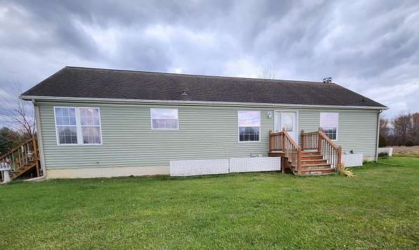 5.7 Acres of Residential Land with Home for Sale in Owosso, Michigan