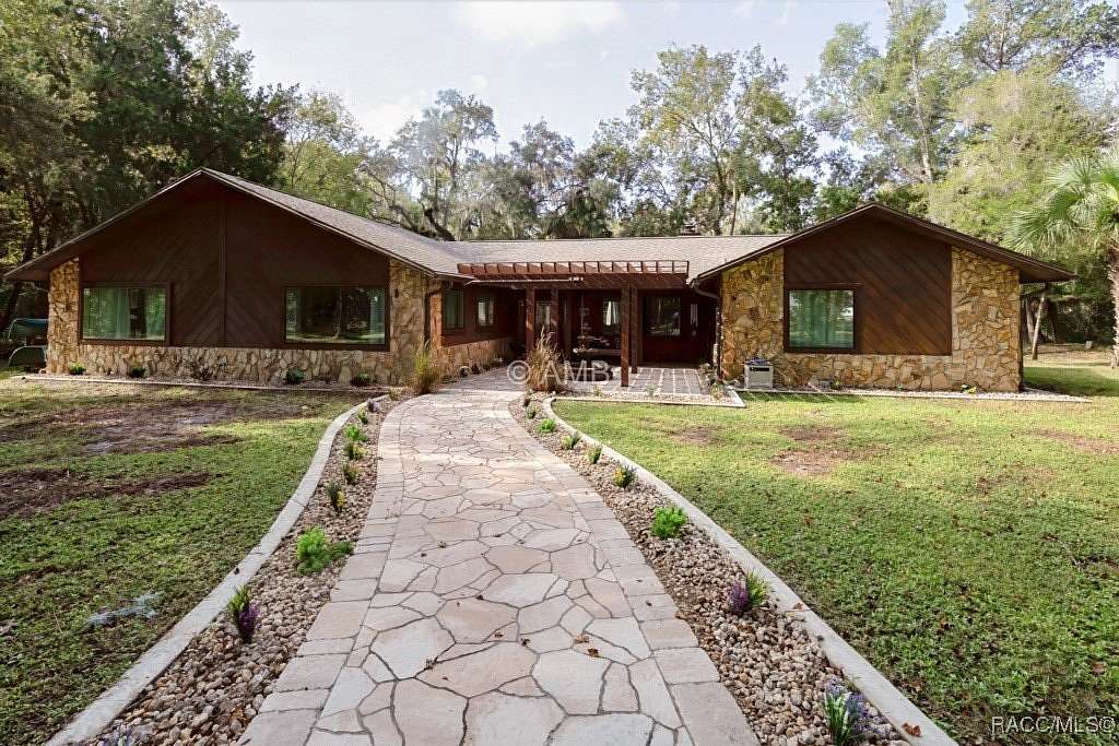 4 Acres of Land with Home for Sale in Inglis, Florida