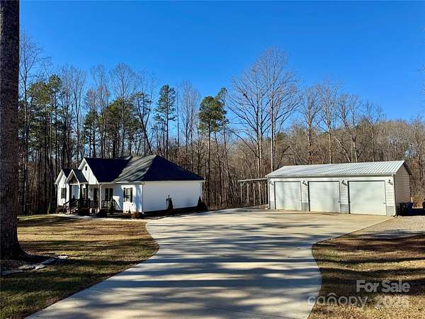 4 Acres of Residential Land with Home for Sale in Mooresville, North Carolina