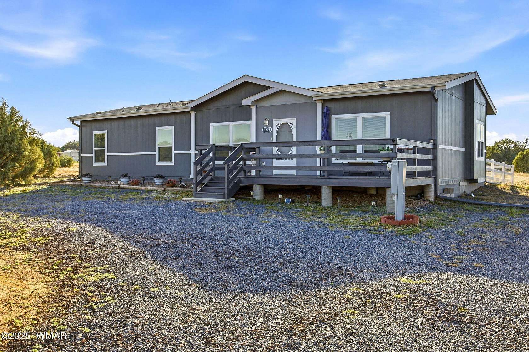 2.5 Acres of Residential Land with Home for Sale in Show Low, Arizona