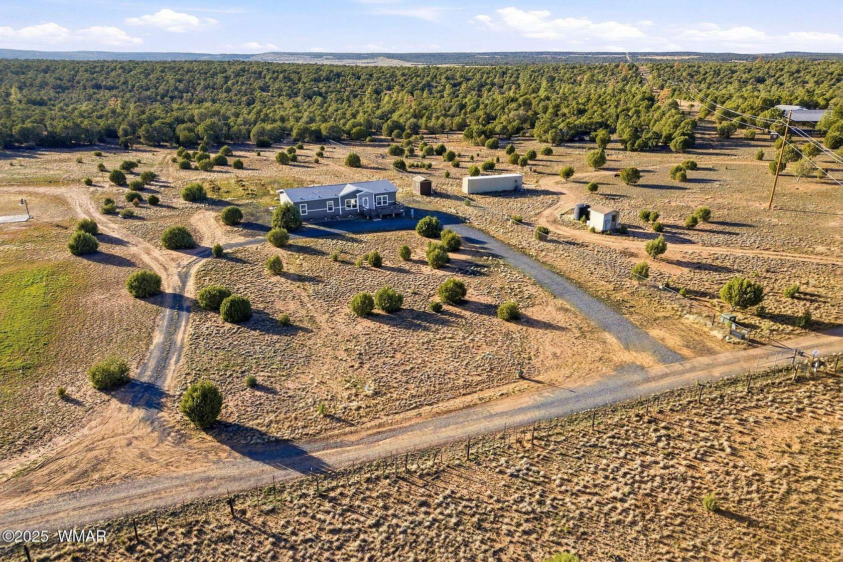 2.5 Acres of Land with Home for Sale in Show Low, Arizona