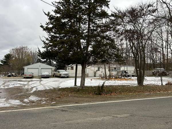 1.7 Acres of Residential Land with Home for Auction in Hastings, Michigan