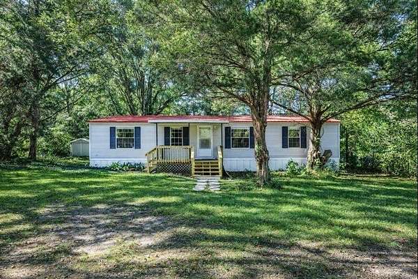 5.3 Acres of Residential Land with Home for Sale in Alachua, Florida