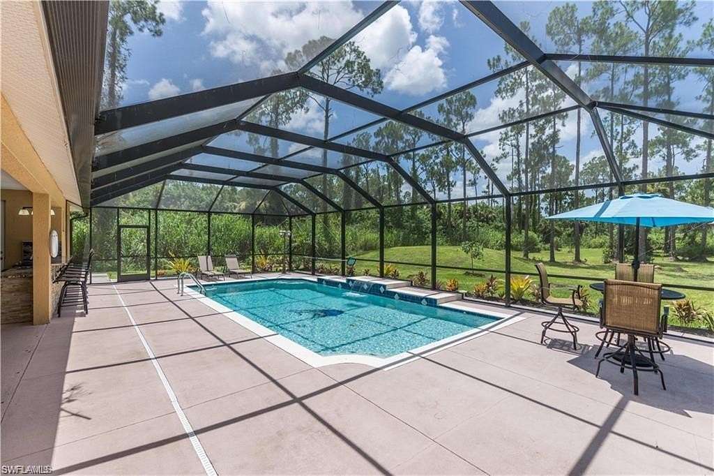 2.27 Acres of Residential Land with Home for Sale in Naples, Florida