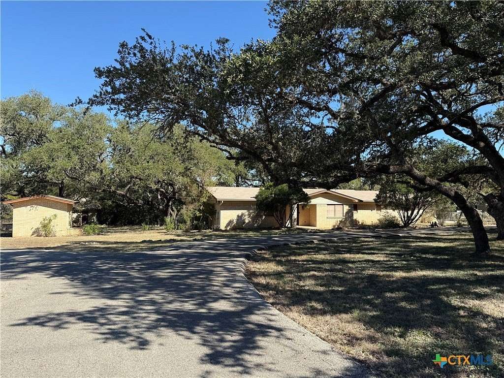 5 Acres of Residential Land with Home for Auction in New Braunfels, Texas