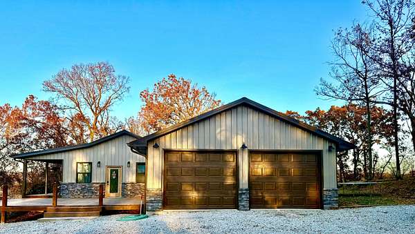 6.4 Acres of Residential Land with Home for Sale in El Dorado Springs, Missouri