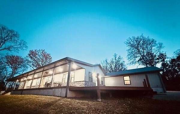 6.4 Acres of Residential Land with Home for Sale in El Dorado Springs, Missouri