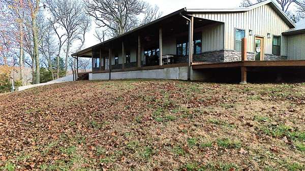 6.4 Acres of Residential Land with Home for Sale in El Dorado Springs, Missouri