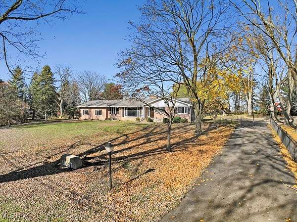 3 Acres of Residential Land with Home for Sale in Louisville, Ohio