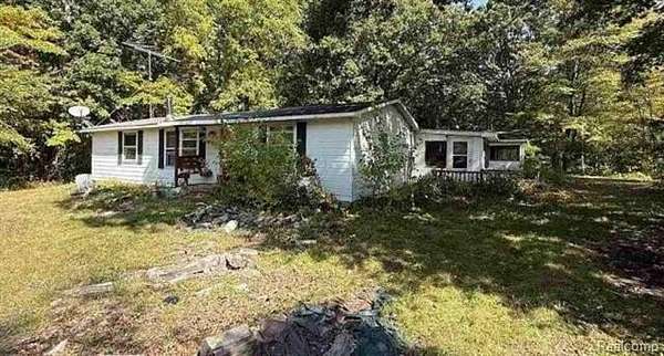 3.17 Acres of Land with Home for Auction in Albee Township, Michigan
