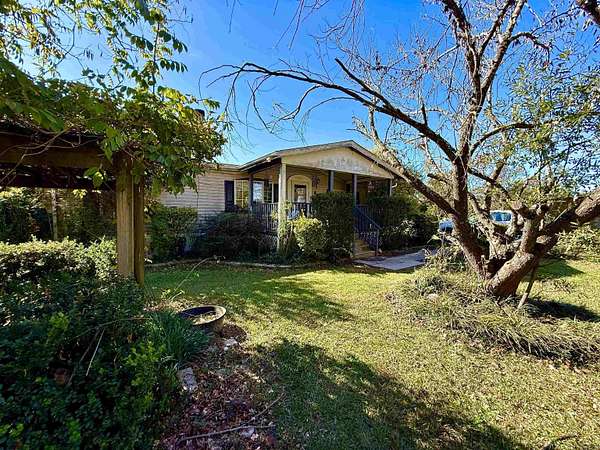 1.7 Acres of Residential Land with Home for Sale in Donaldson, Arkansas