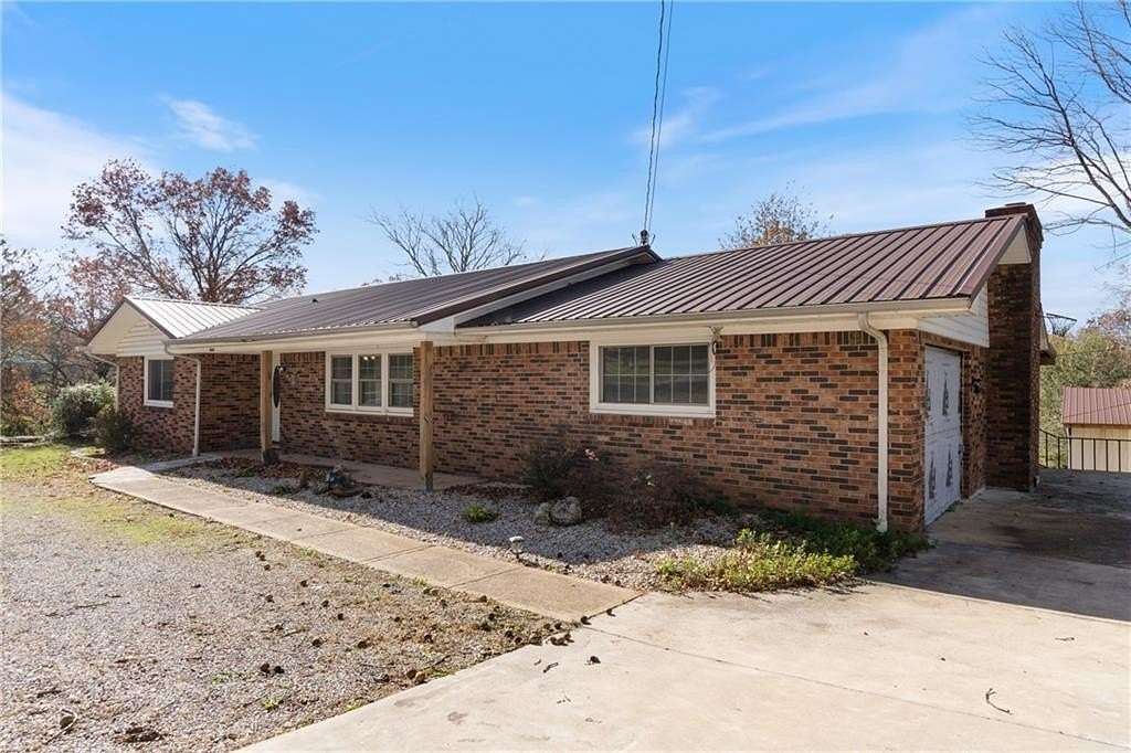 1.53 Acres of Residential Land with Home for Sale in Berryville, Arkansas