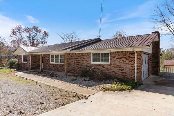 1.53 Acres of Land with Home for Sale in Berryville, Arkansas