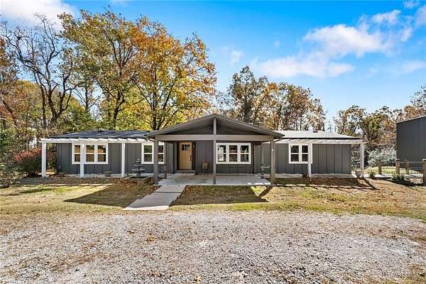 4 Acres of Residential Land with Home for Sale in Bentonville, Arkansas