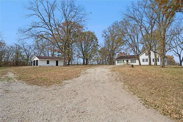 12.5 Acres of Land with Home for Sale in Chilhowee, Missouri