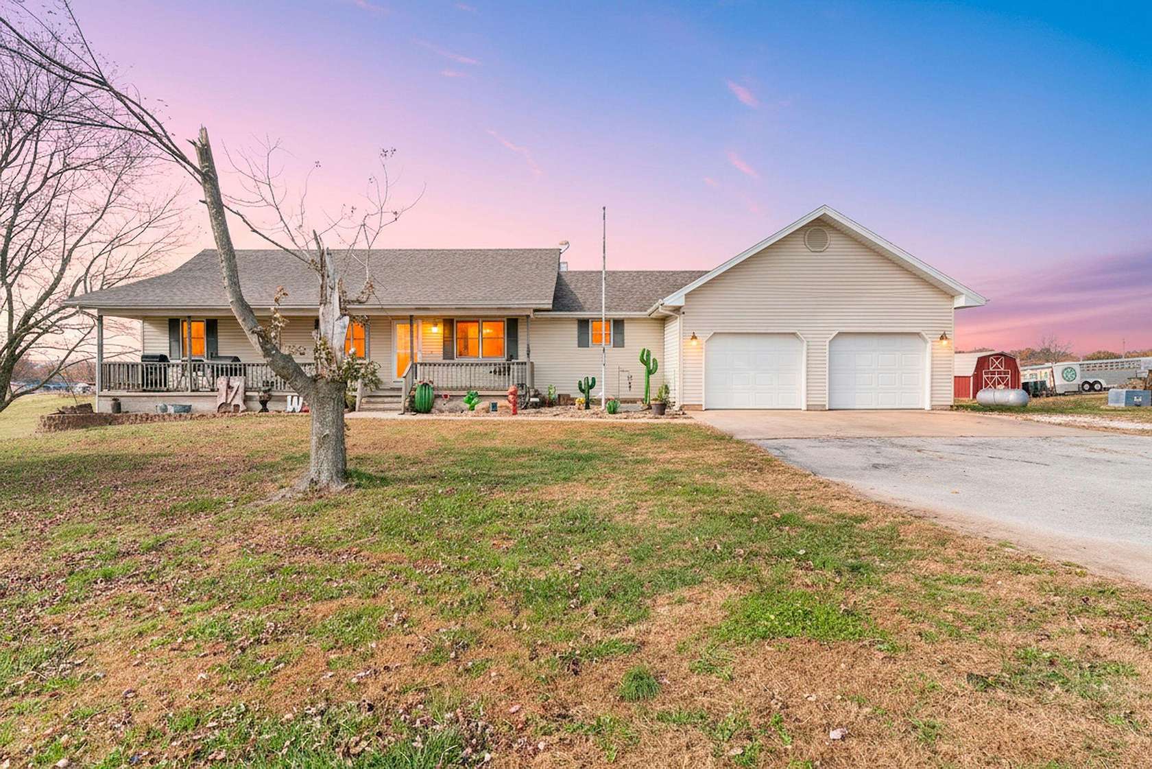 10 Acres of Land with Home for Sale in Bois D'Arc, Missouri