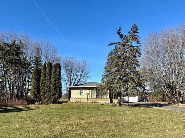 2.37 Acres of Residential Land with Home for Sale in Hatley, Wisconsin