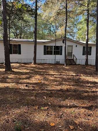 36.9 Acres of Recreational Land with Home for Sale in Auburn, Alabama