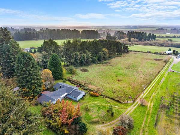 9.34 Acres of Residential Land with Home for Sale in Smith River, California