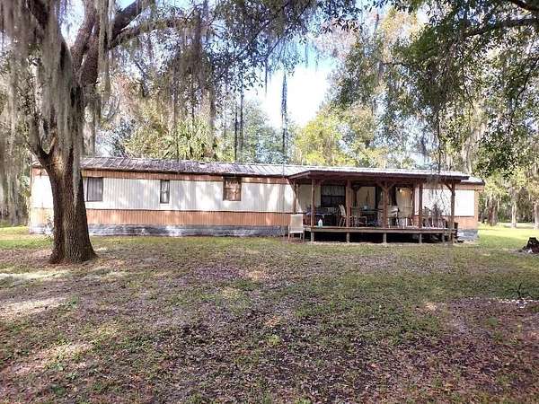 2.5 Acres of Residential Land with Home for Sale in Bunnell, Florida